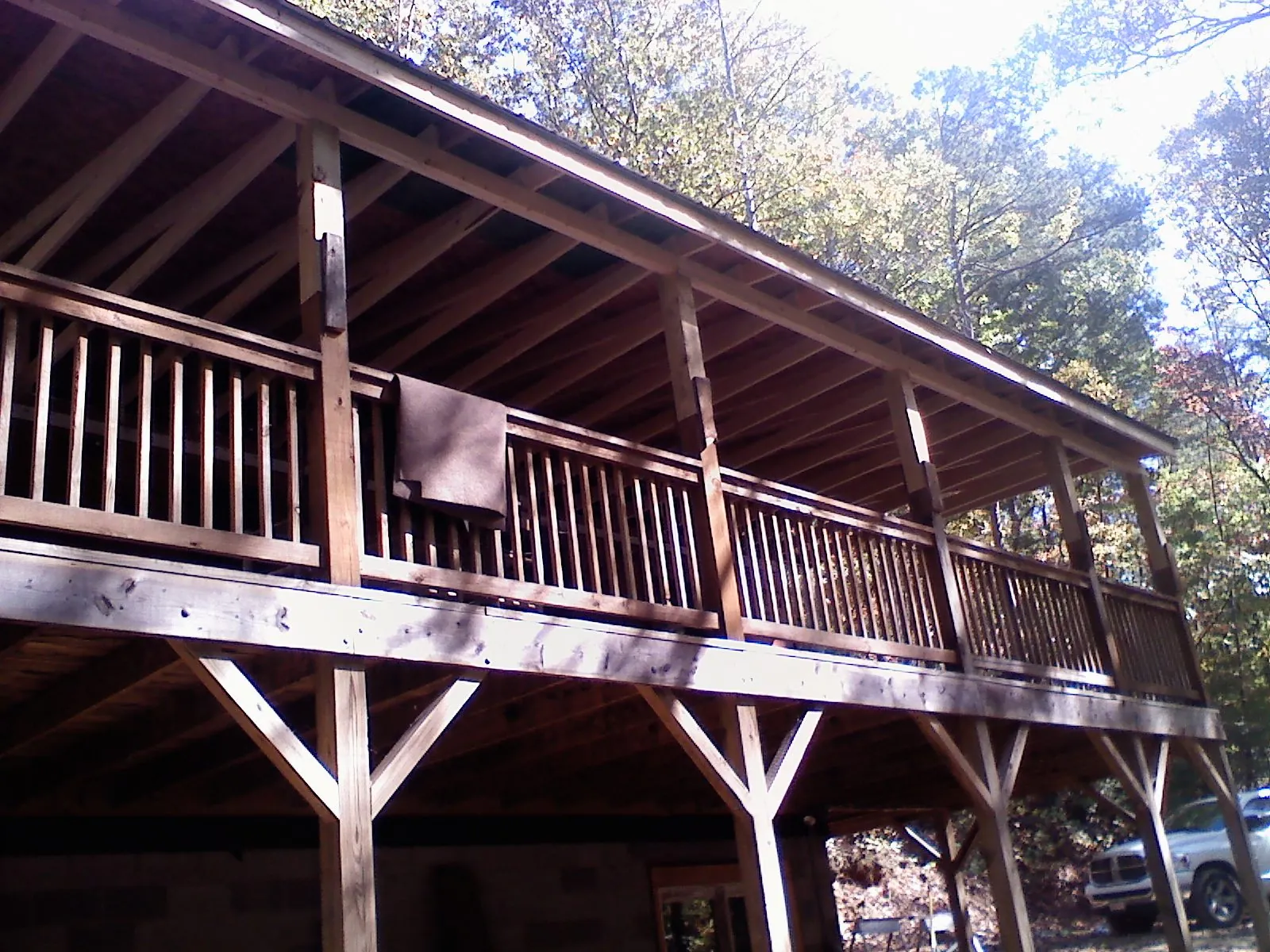 Timber framing under a new elevated porch and deck — Roof Leak Repair in Central by Roofing Brothers